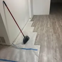 Vinyl plank flooring laid up to a staircase