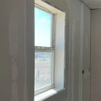 Drywall corner finished around a bedroom window